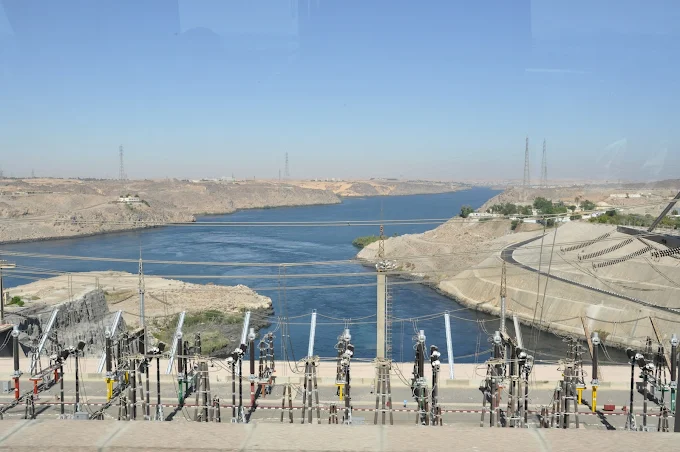 View of the Aswan High Dam overlooking the Nile River, a modern engineering marvel controlling the water flow in Egypt.