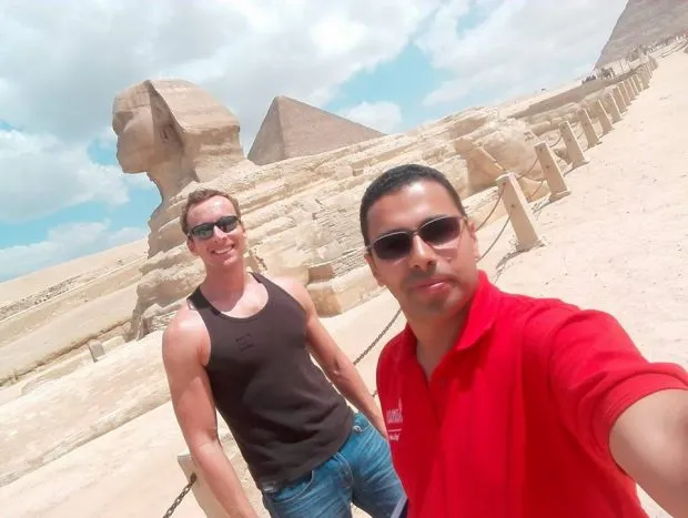 Ramses Tower private guide leading an exclusive tour at the Great Pyramids and Sphinx.