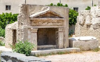 Ancient Roman burial site at the Catacombs of Kom El Shoqafa in Alexandria, showcasing Greco-Roman architectural influence.