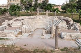 The well-preserved marble seating and columns of the ancient Roman Amphitheatre in Alexandria, Egypt.