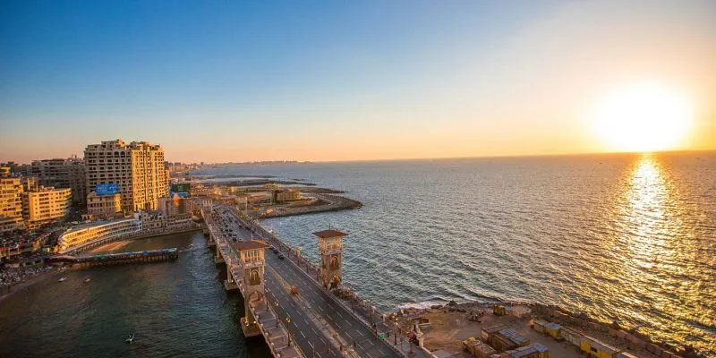 A panoramic sunset view of Stanley Bridge, a highlight of the top 20 Alexandria Egypt tours and excursions.