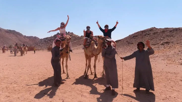 Egypt desert safari camel tour group