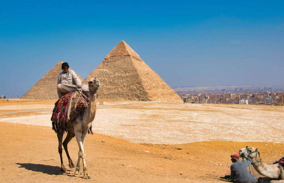 Bedouin camel rider in desert for authentic Egypt travel experience