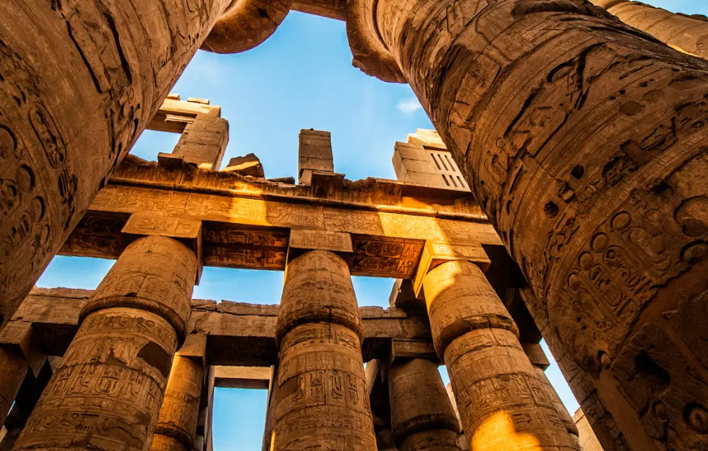 Karnak Temple columns under sunny Luxor weather
