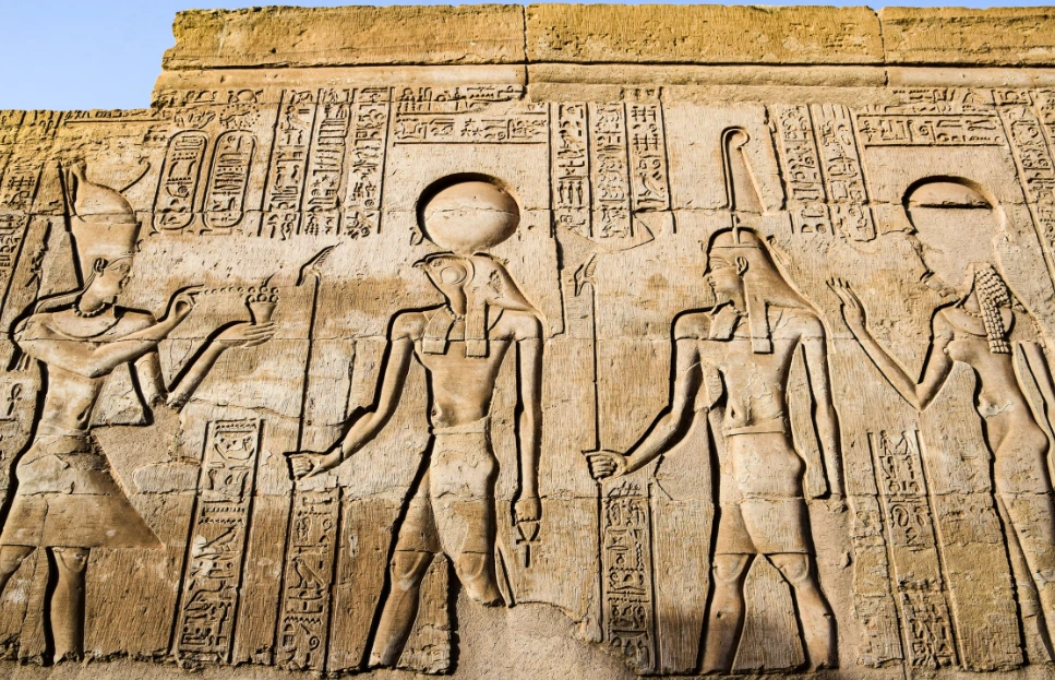 Detailed pharaonic wall carvings at ancient Egyptian sites