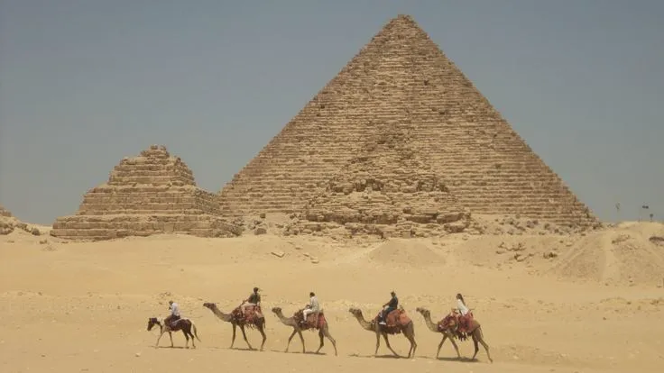 Group camel ride with egypt family tours