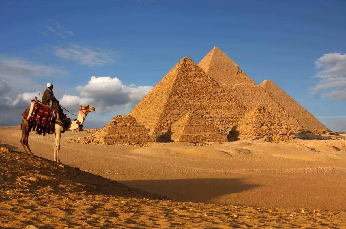 Traveler riding camel asking is it safe to travel to egypt now