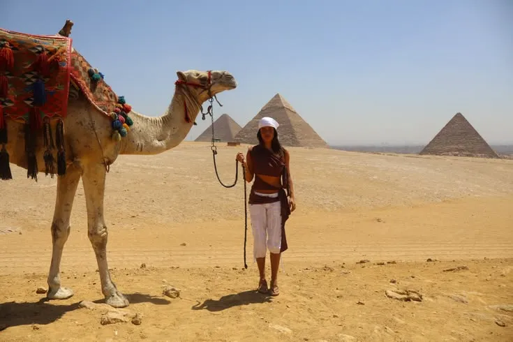 Solo female traveler exploring Giza Pyramids safely