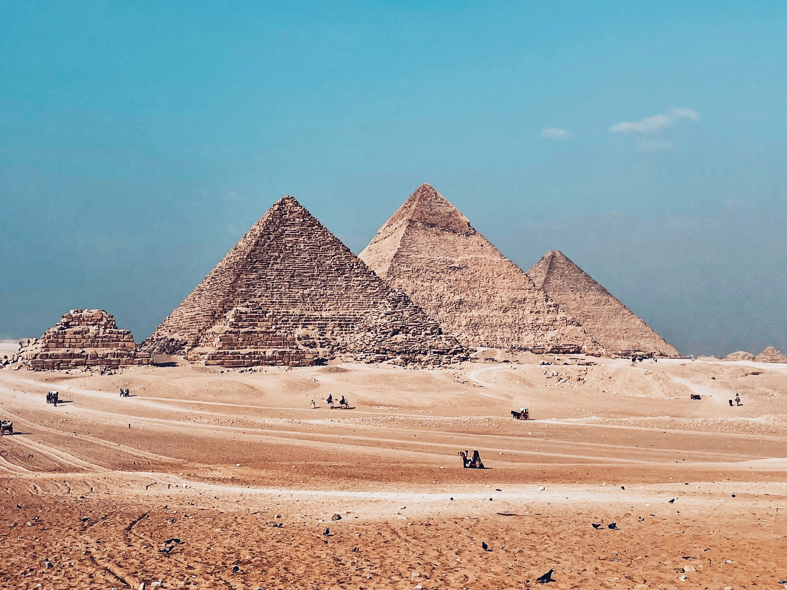 Panoramic desert view of Giza pyramids when you travel to Egypt